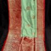 Light Pistachio Green And Red Border IZA Pure Handloom Katan Silk Saree