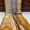 Lavender Grey And Golden Yellow Border Banarasee Pure Handloom Khaddi Silk Saree
