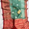 Light Mint Green And Red Border Exclusive Mashru Border Kora Banarasi Silk Saree