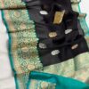 Black And Turquoise Border Exclusive Mashru Border Kora Banarasi Silk Saree