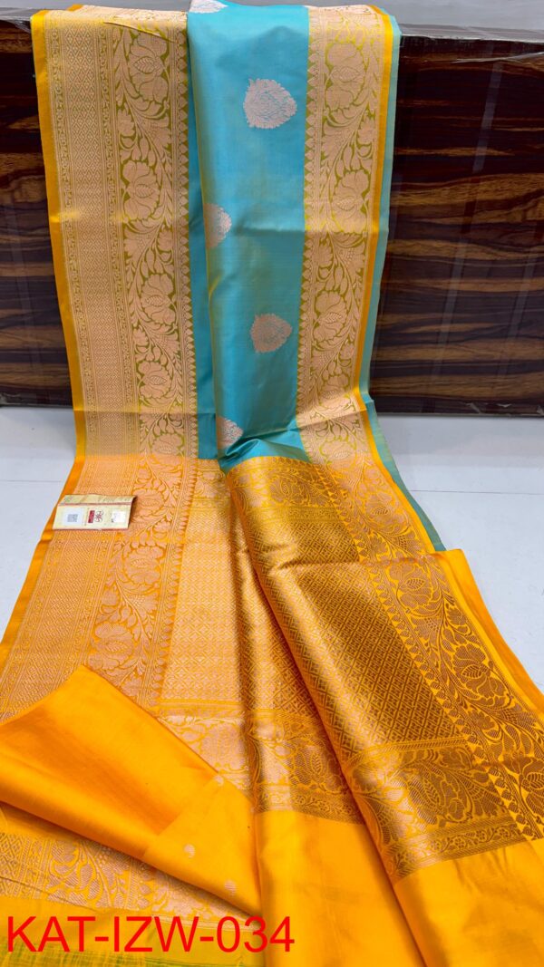 Sky Blue And Golden Yellow Border IZA Pure Handloom Katan Silk Saree with Pure Antique Zari