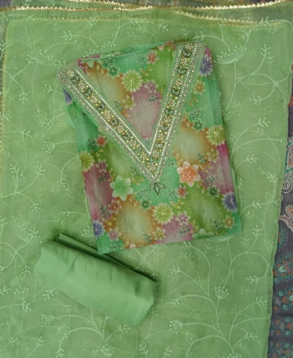 Premium green organza embroidered floral dress material with matching embroidered organza dupatta.
