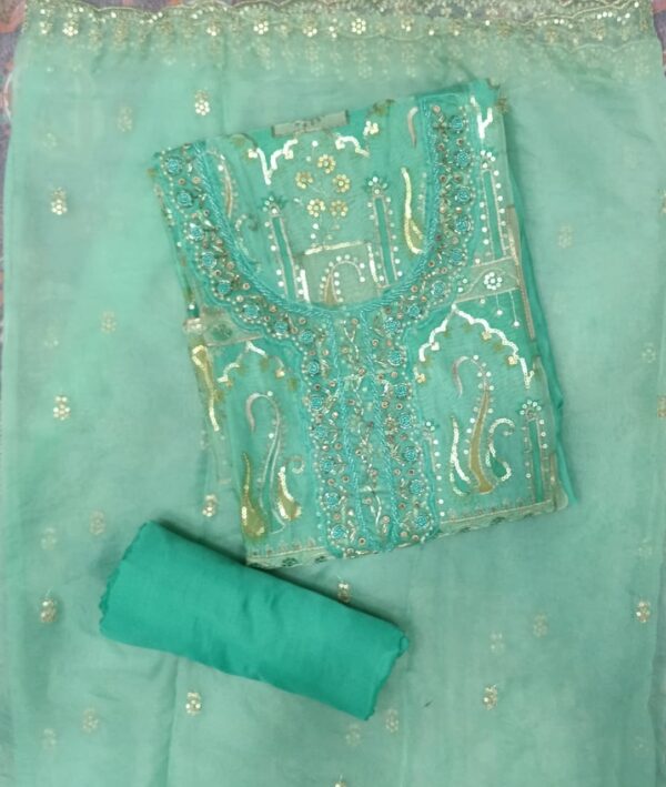 Premium aqua blue organza embroidered dress material with matching embroidered organza dupatta.
